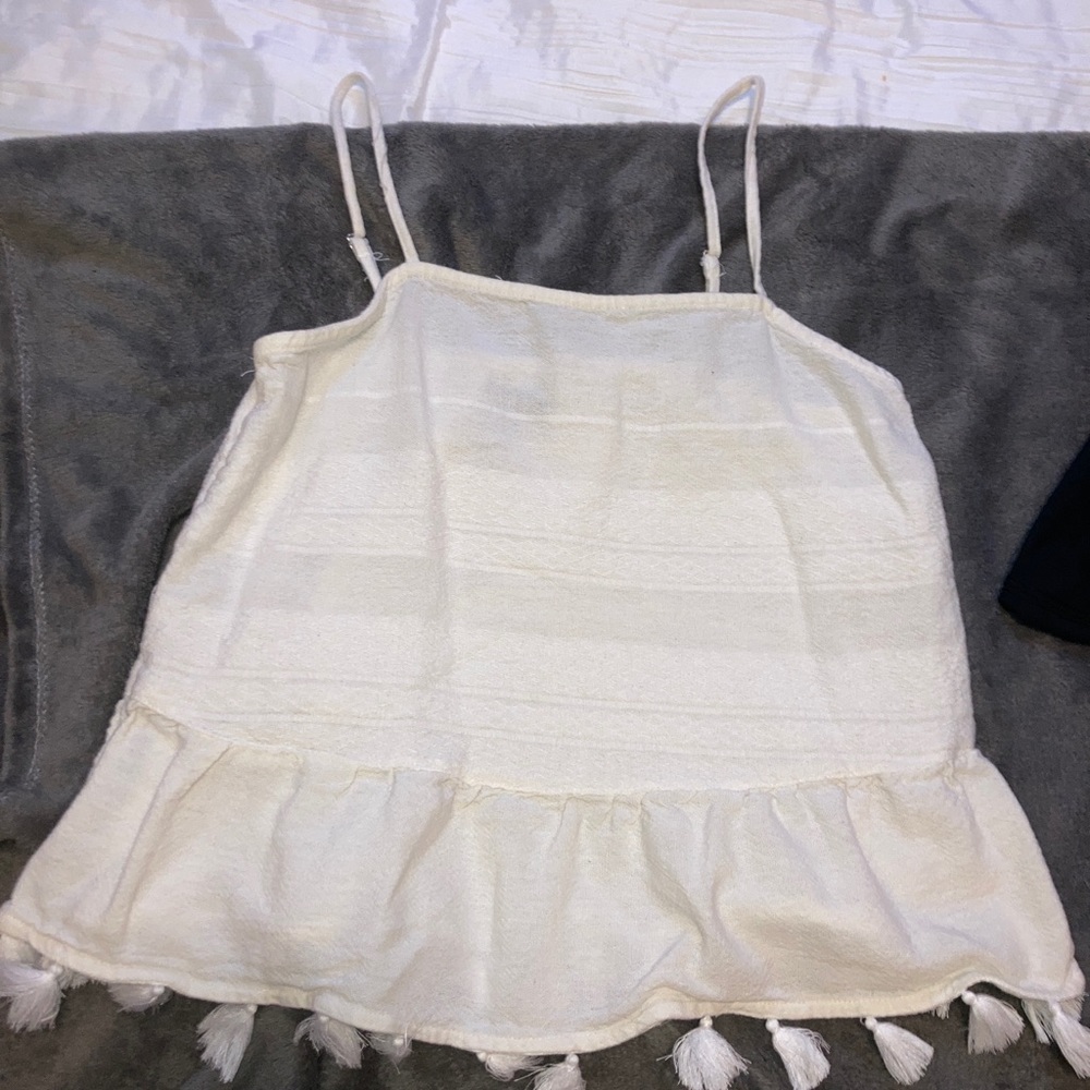 Cream with tassels on bottom super cute tank